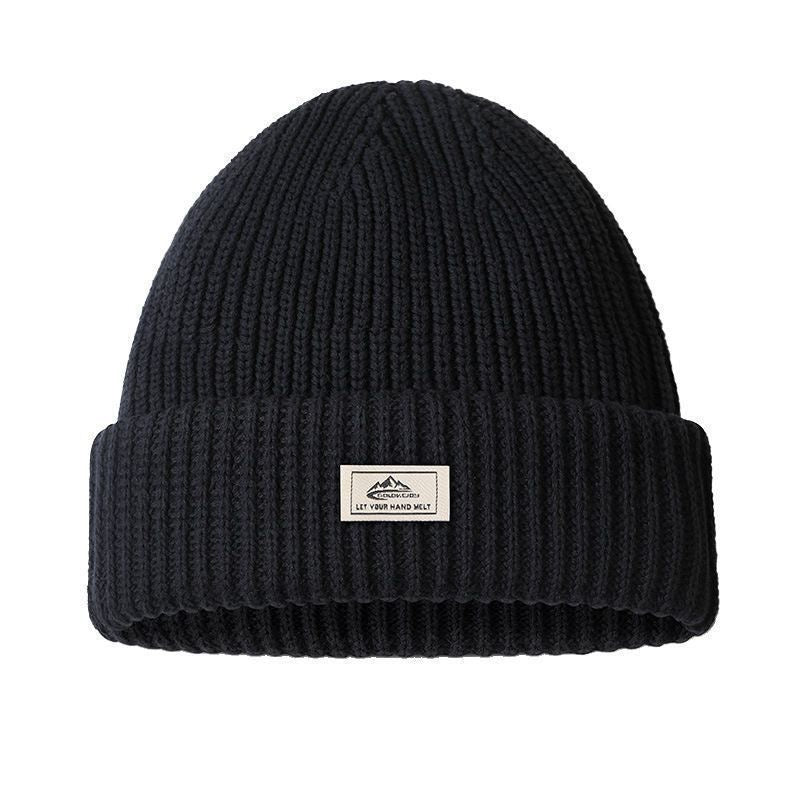 Stay warm in style with this 2-in-1 knitted cap